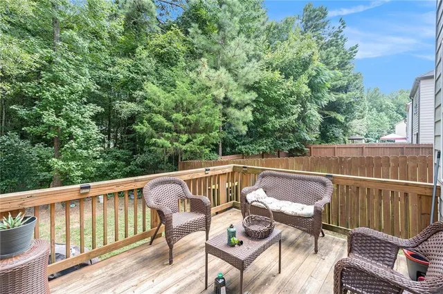 a view of balcony with furniture