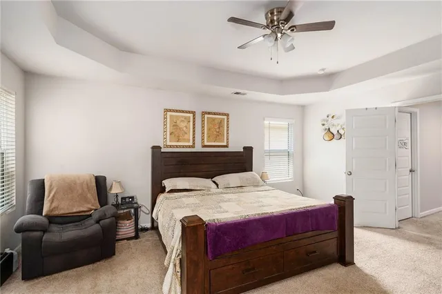 a bed room with a bed and furniture