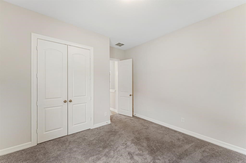2311 Jitterbug Lane Katy, TX 77493 - Photo 19 of 25 a view of an empty room