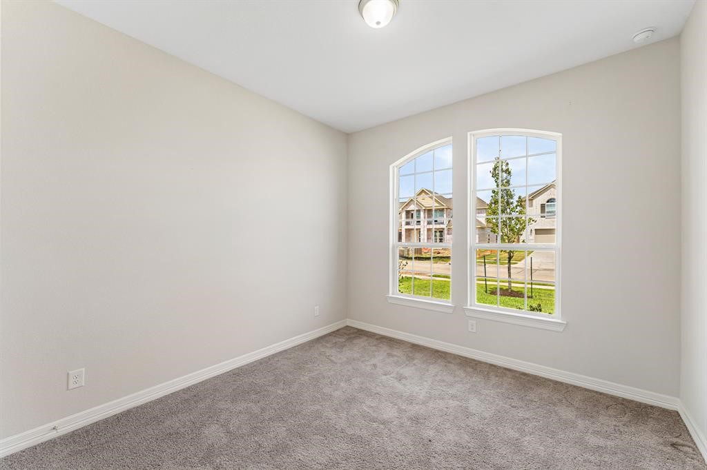 2311 Jitterbug Lane Katy, TX 77493 - Photo 21 of 25 an empty room with a window