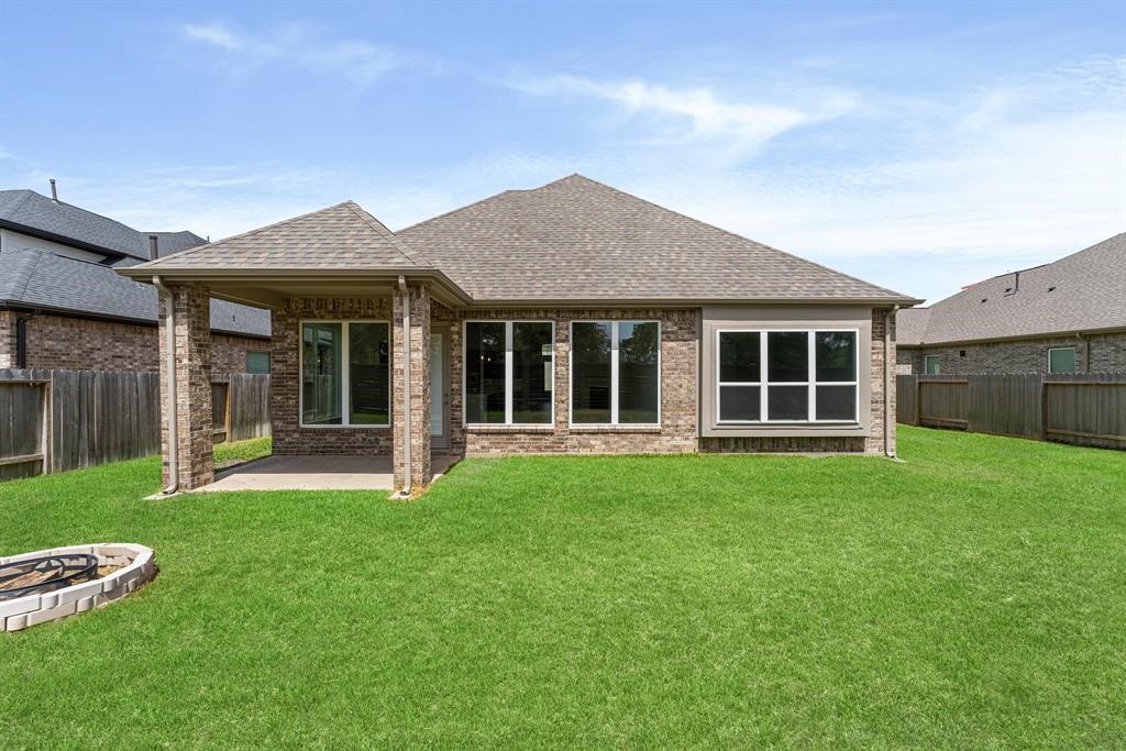 2311 Jitterbug Lane Katy, TX 77493 - Photo 23 of 25 front view of a house with a yard