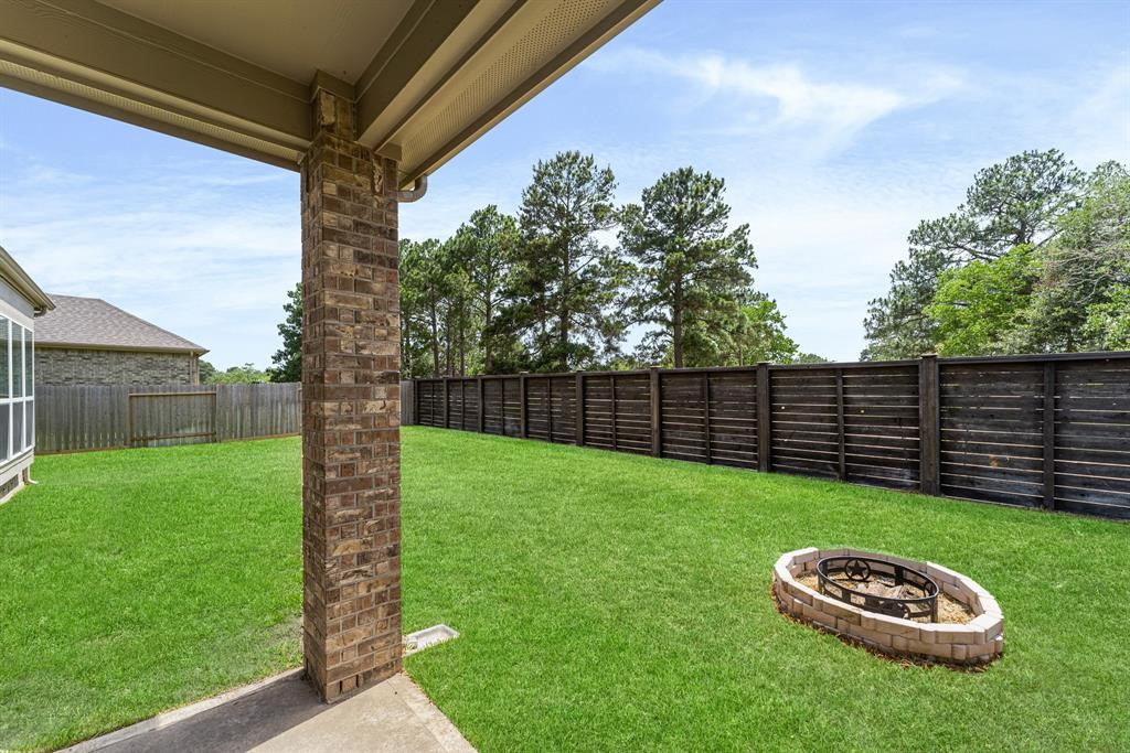 2311 Jitterbug Lane Katy, TX 77493 - Photo 25 of 25 a view of a backyard with a sink
