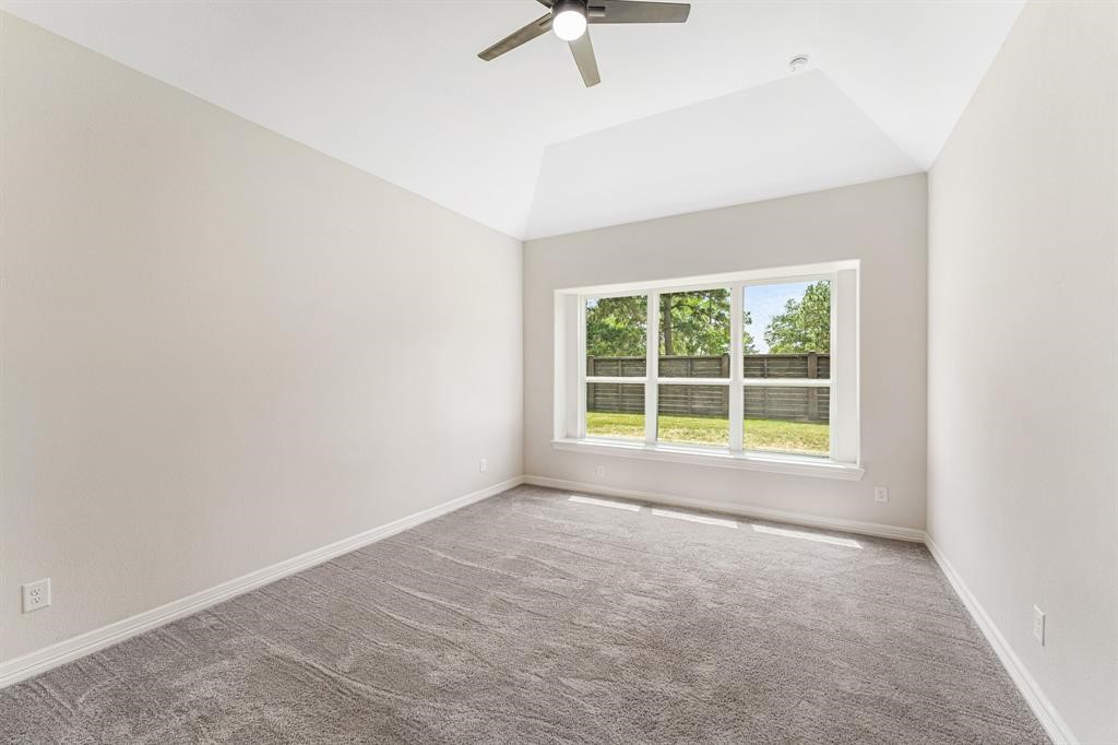 2311 Jitterbug Lane Katy, TX 77493 - Photo 10 of 25 an empty room with a window