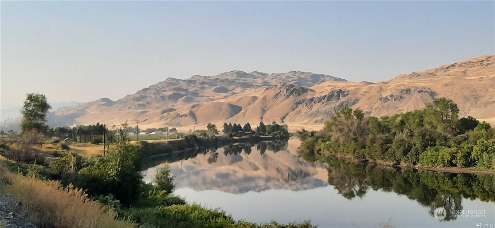 628 Monse River Road Brewster, WA 98812 - Photo 1 of 5 a view of a city with a mountain in the background