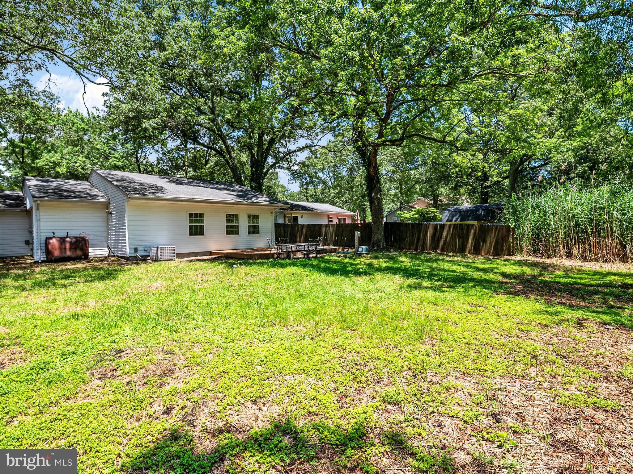 1395 Rainbow Drive Pasadena, MD 21122 - Photo 28 of 28 a front view of house with yard and seating area