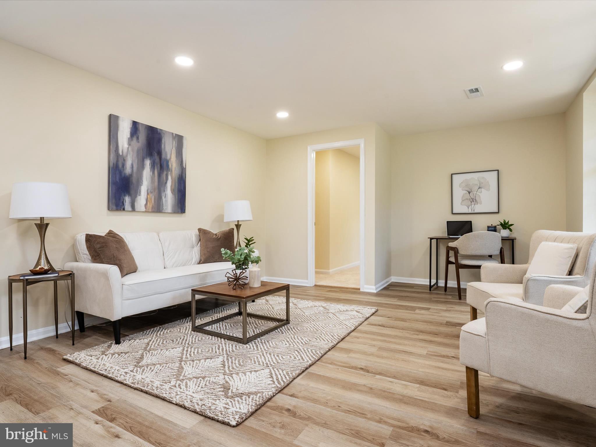 1395 Rainbow Drive Pasadena, MD 21122 - Photo 5 of 28 a living room with furniture and a lamp