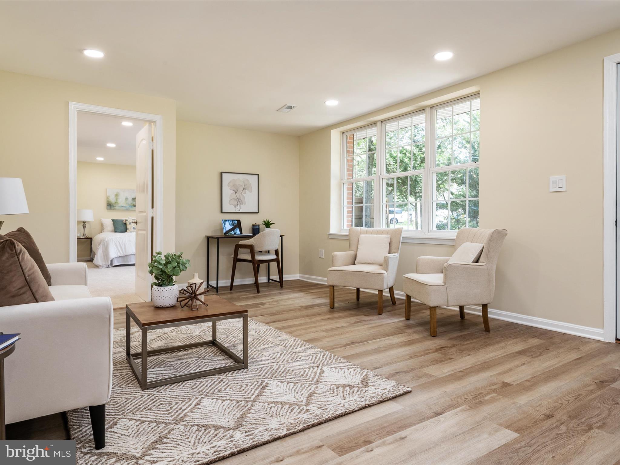 1395 Rainbow Drive Pasadena, MD 21122 - Photo 6 of 28 a living room with furniture and a large window