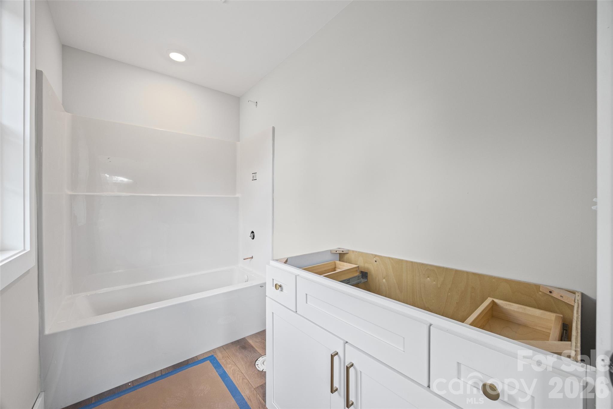 640 Edwards Road Fort Lawn, SC 29714 - Photo 31 of 39 a bathroom with a tub sink and vanity
