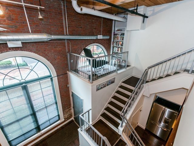 a view of an entryway with a small stove