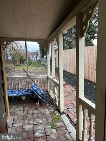 a view of balcony with a potted plant