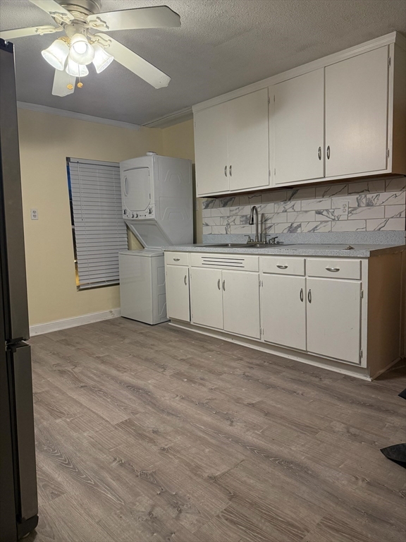 360 School Street, Unit 2 Webster, MA 01570 - Photo 3 of 21 a kitchen with cabinets and window