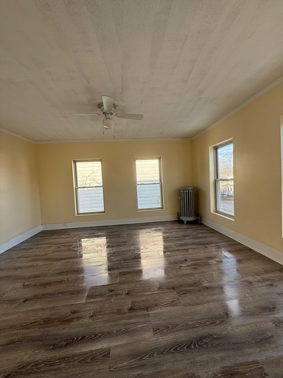 360 School Street, Unit 2 Webster, MA 01570 - Photo 7 of 21 a view of empty room with window and wooden floor