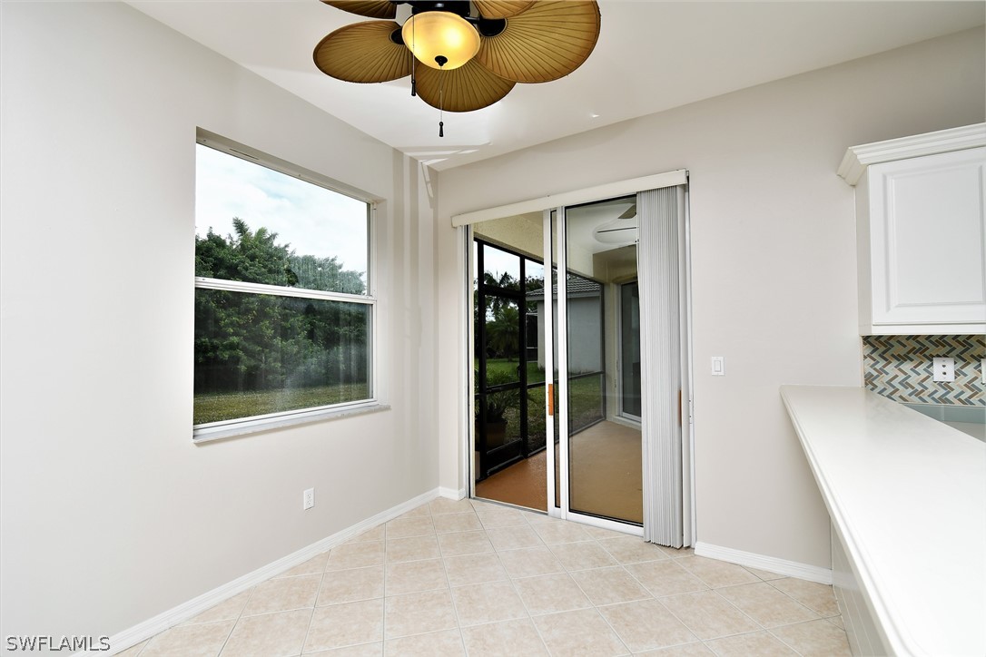 4612 Fairloop Run Lehigh Acres, FL 33973 - Photo 18 of 35 a view of an empty room and window