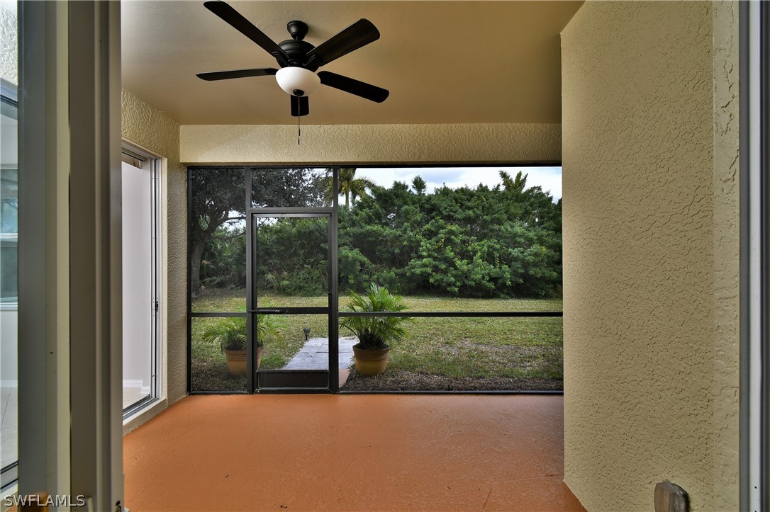 4612 Fairloop Run Lehigh Acres, FL 33973 - Photo 25 of 35 a view of a big room with a big yard