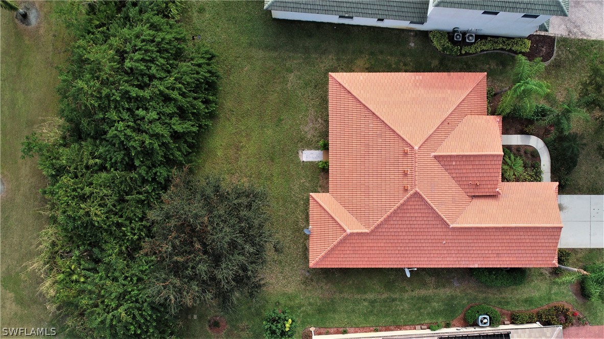 4612 Fairloop Run Lehigh Acres, FL 33973 - Photo 28 of 35 an aerial view of a house