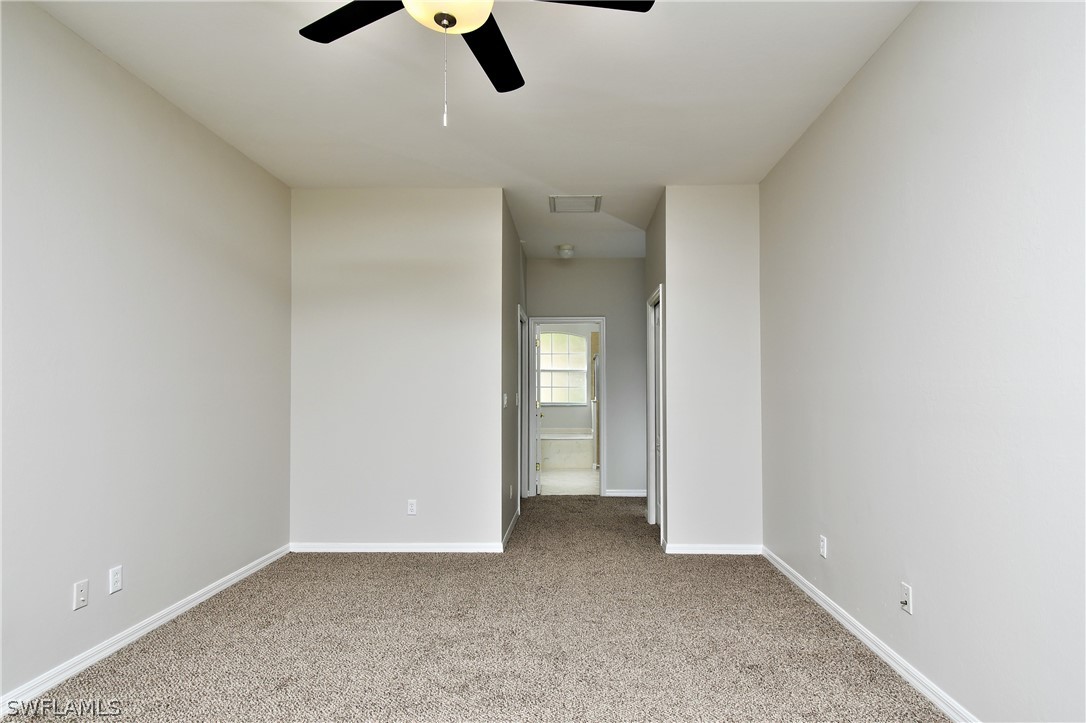 4612 Fairloop Run Lehigh Acres, FL 33973 - Photo 8 of 35 wooden floor in an empty room