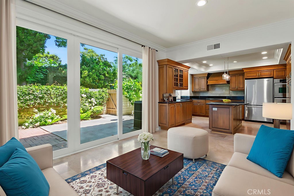 26 Tahoe Irvine, CA 92612 - Photo 15 of 40 a living room with furniture and a window