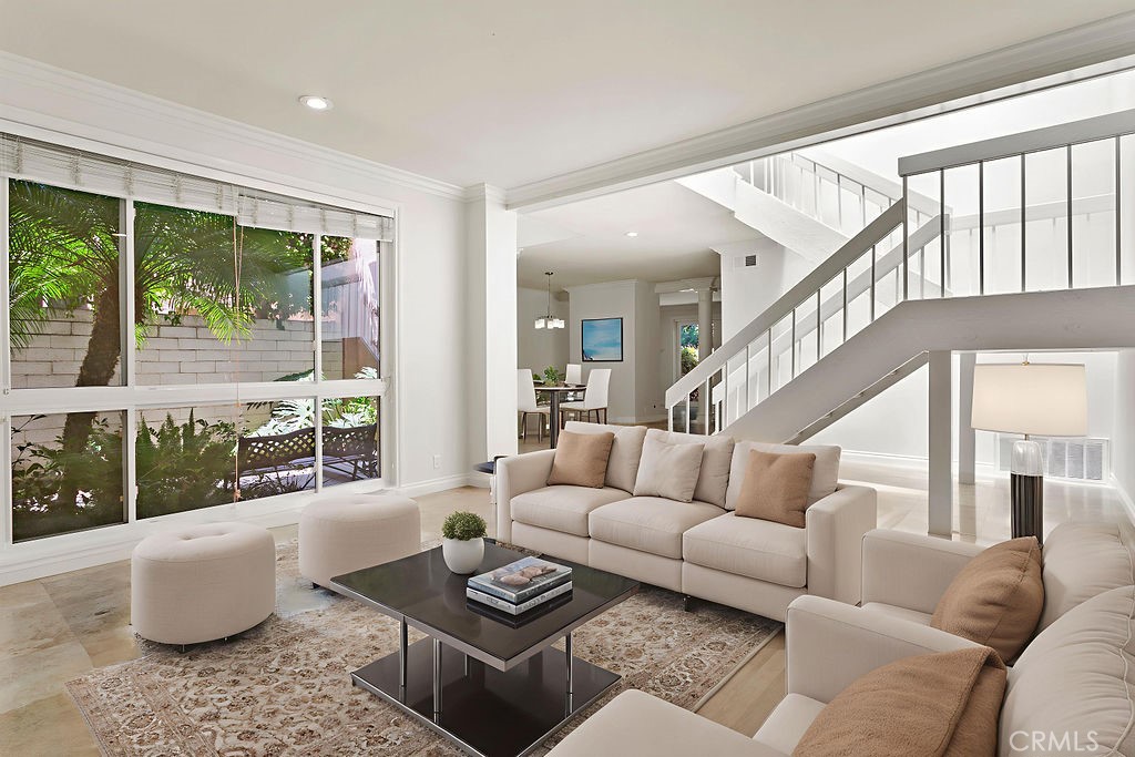 26 Tahoe Irvine, CA 92612 - Photo 20 of 40 a living room with furniture and a large window