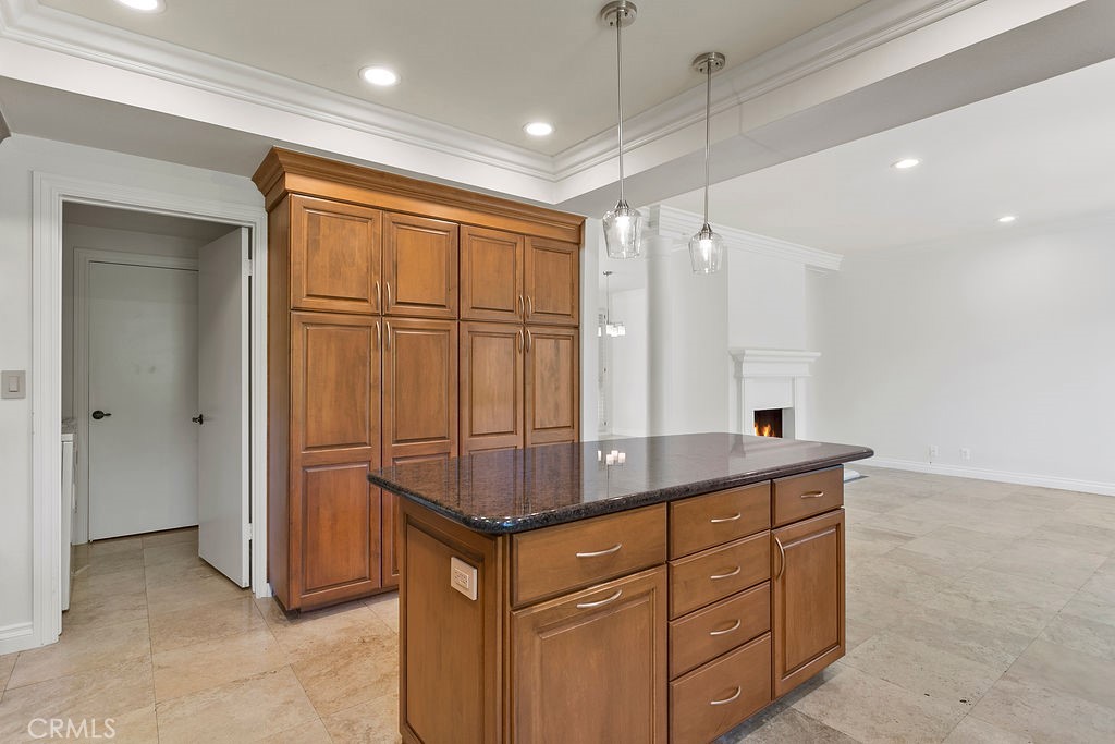 26 Tahoe Irvine, CA 92612 - Photo 30 of 40 a kitchen with stainless steel appliances granite countertop a sink and a refrigerator