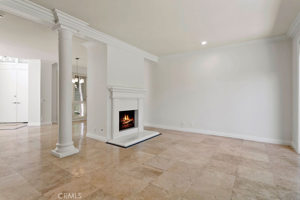 26 Tahoe Irvine, CA 92612 - Photo 32 of 40 a view of an empty room with a fireplace