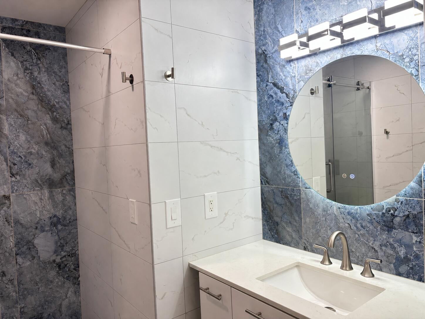 330 Sandalwood Lane Boca Raton, FL 33487 - Photo 16 of 23 a bathroom with a sink and mirror