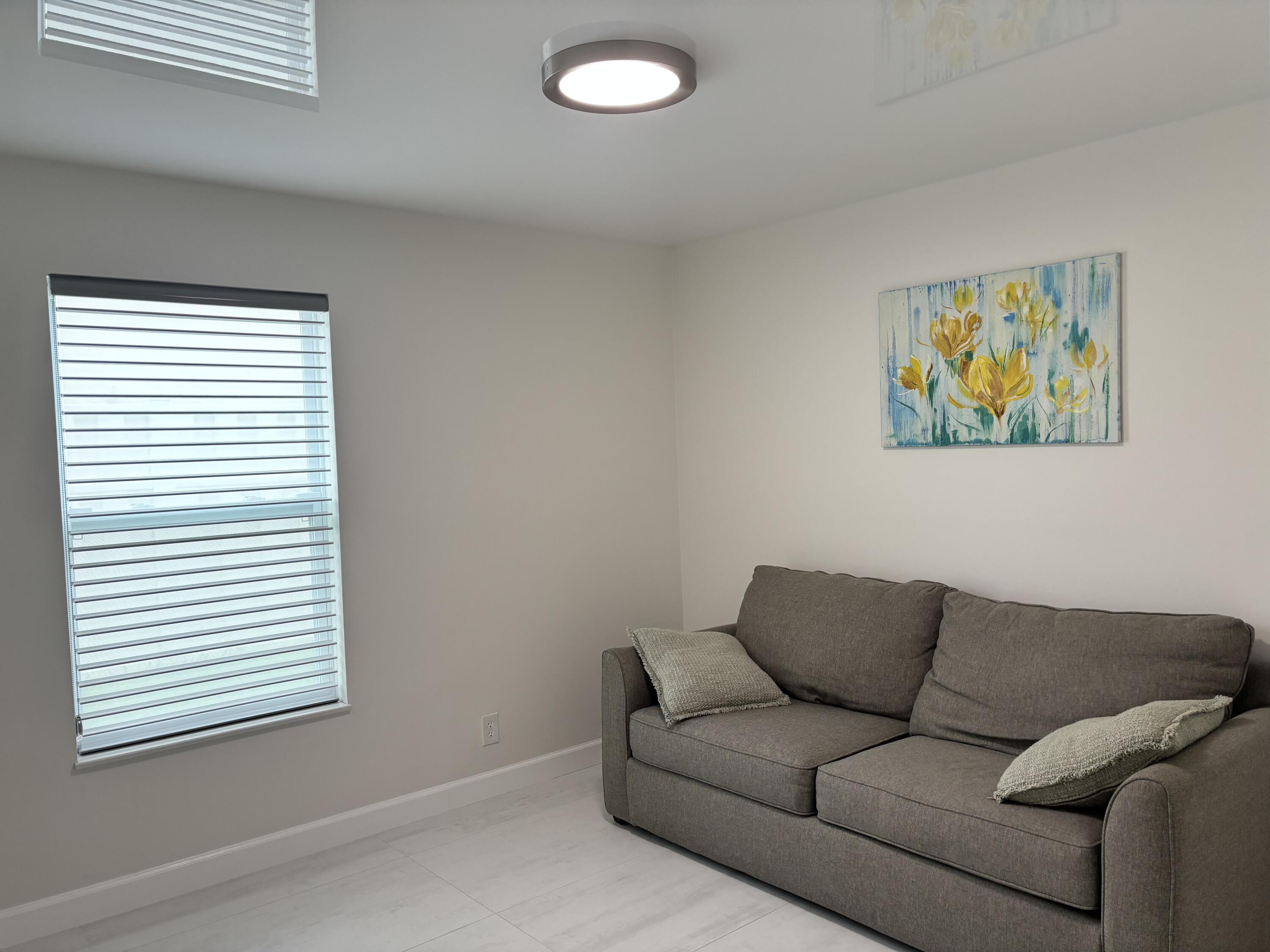 330 Sandalwood Lane Boca Raton, FL 33487 - Photo 17 of 23 a living room with furniture and a window