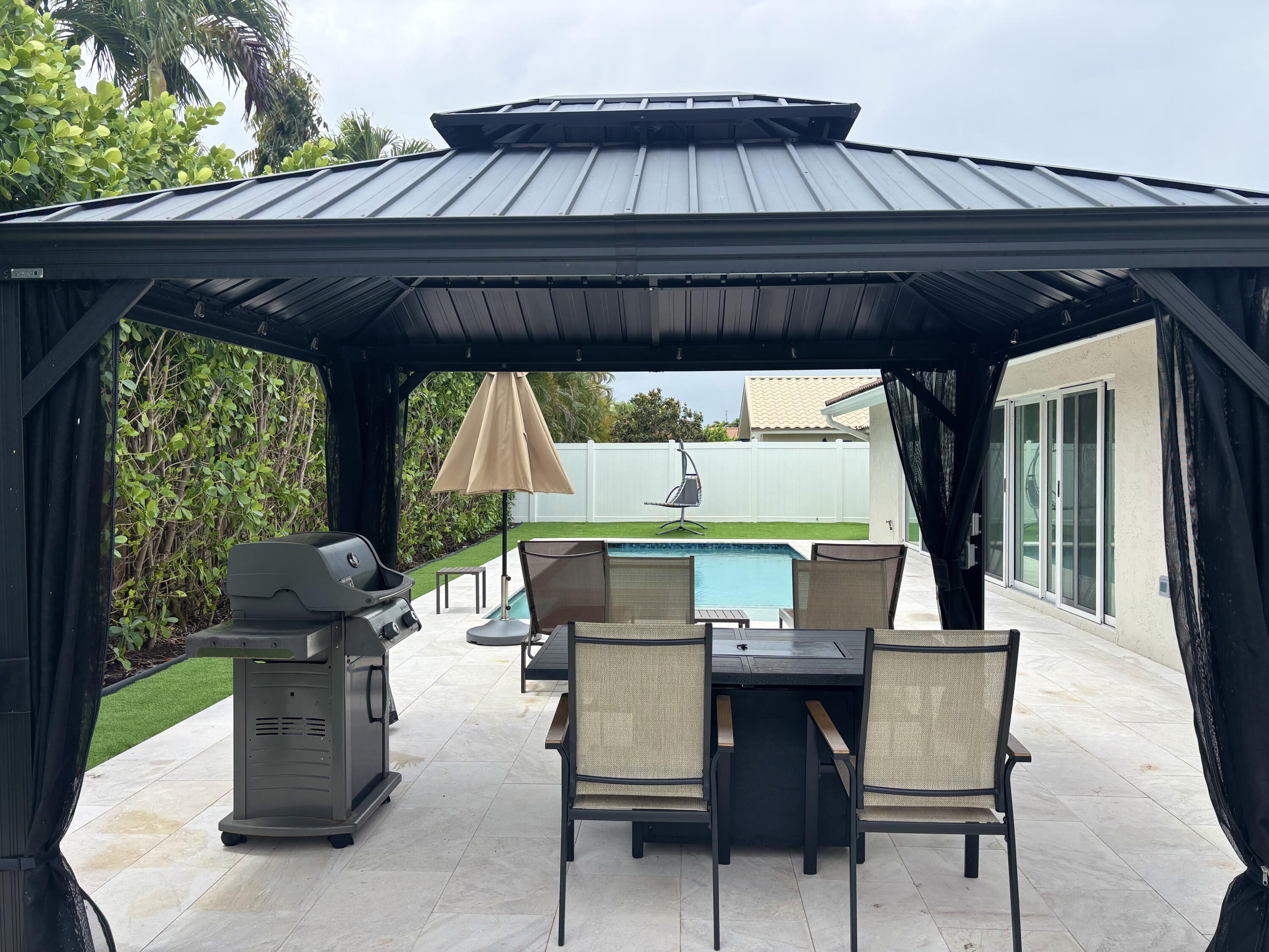 330 Sandalwood Lane Boca Raton, FL 33487 - Photo 9 of 23 a view of outdoor seating