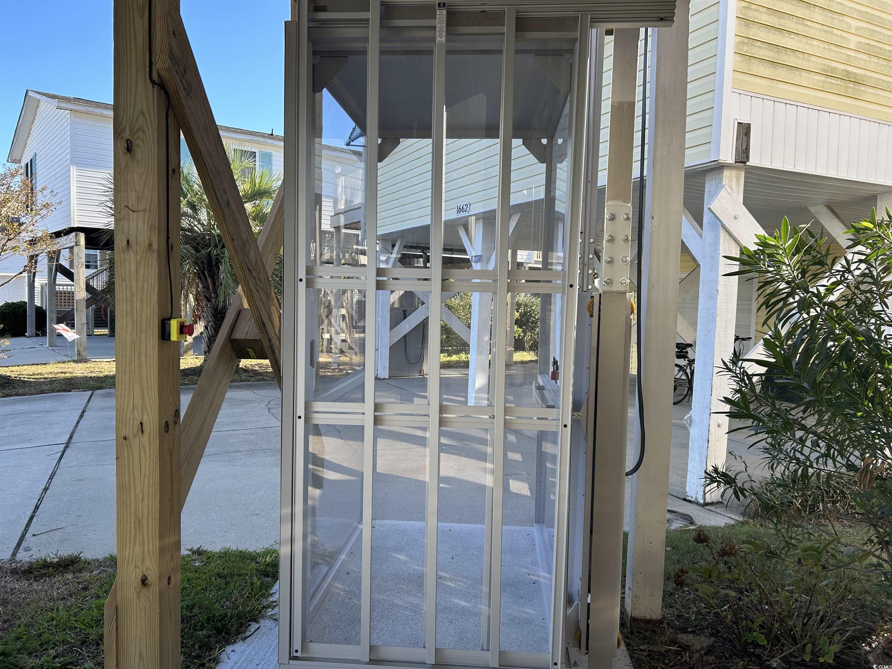 1656 Mason Circle Murrells Inlet, SC 29576 - Photo 2 of 40 Lift to second floor.