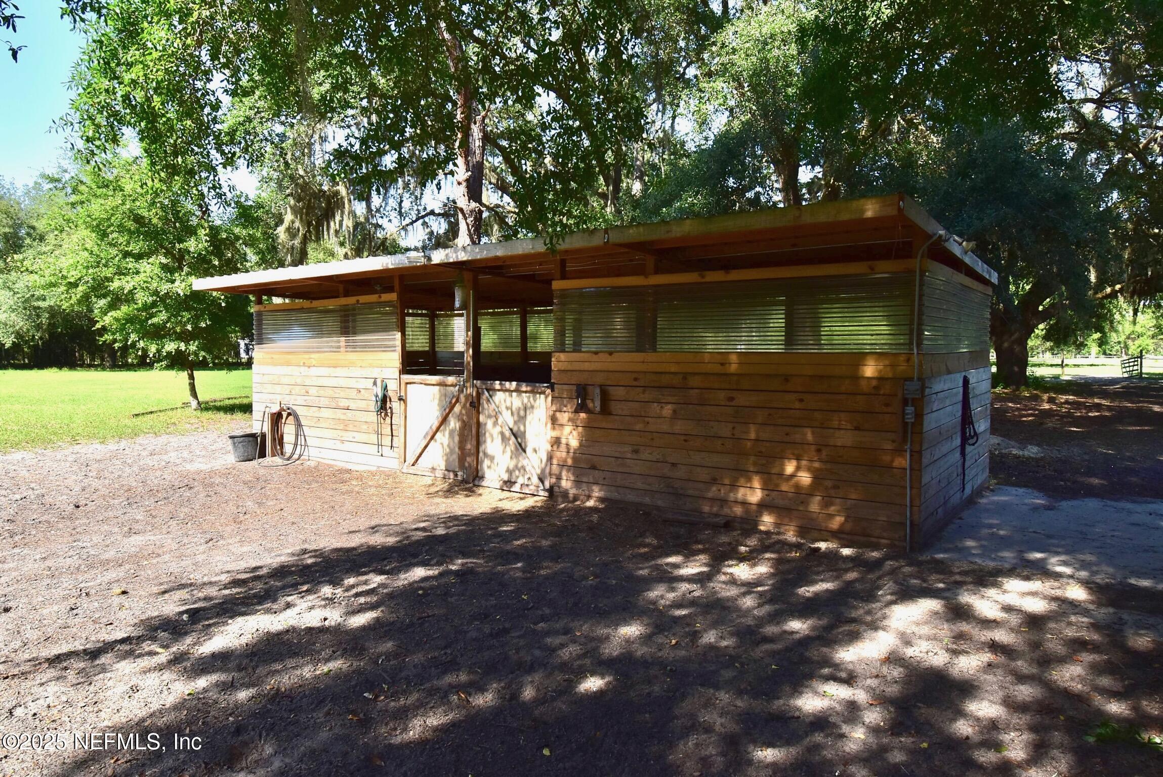 500 Georgetown Shortcut Road Georgetown, FL 32139 - Photo 13 of 59 a view of a house with a yard