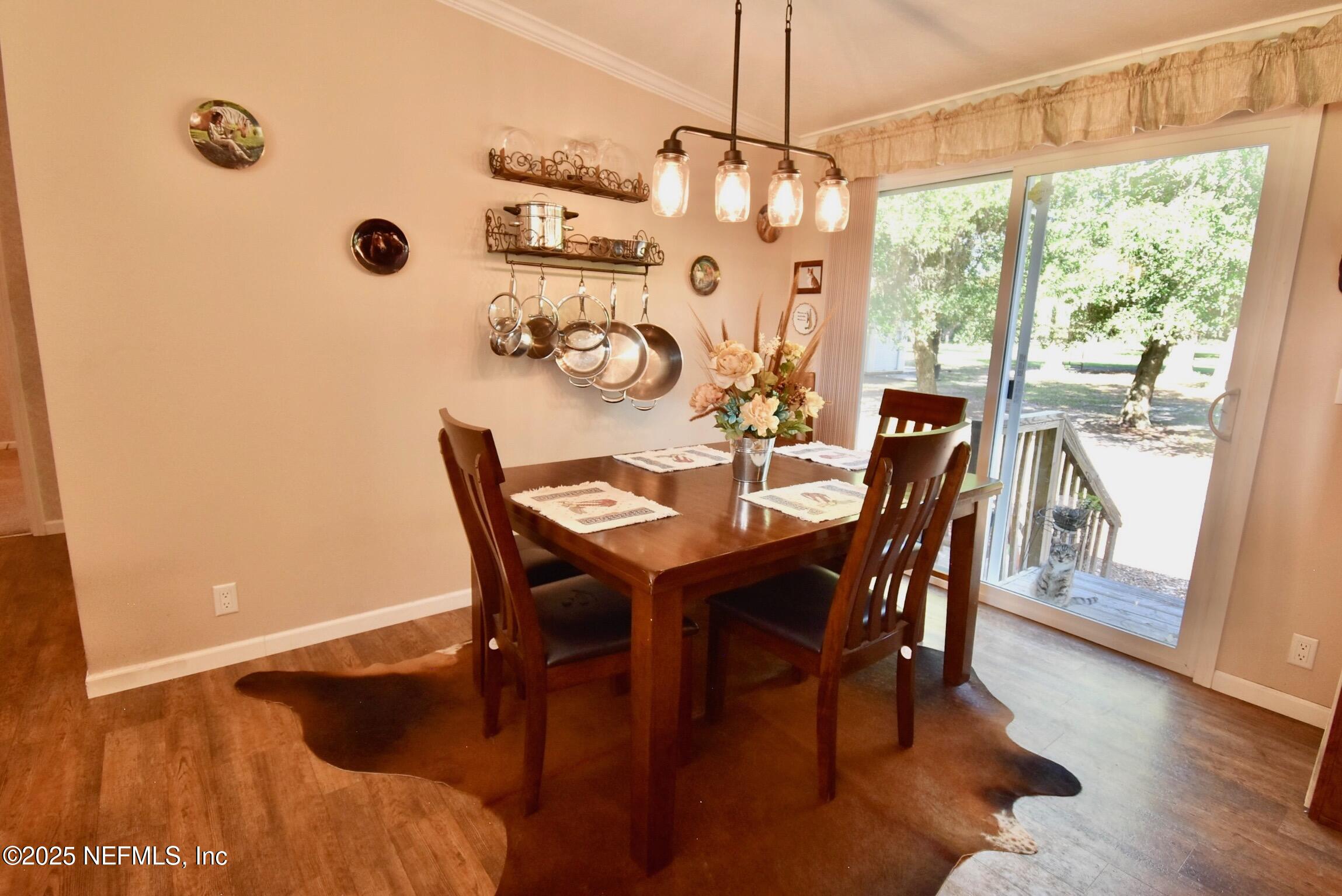 500 Georgetown Shortcut Road Georgetown, FL 32139 - Photo 30 of 59 a view of a dining room with furniture window and outside view