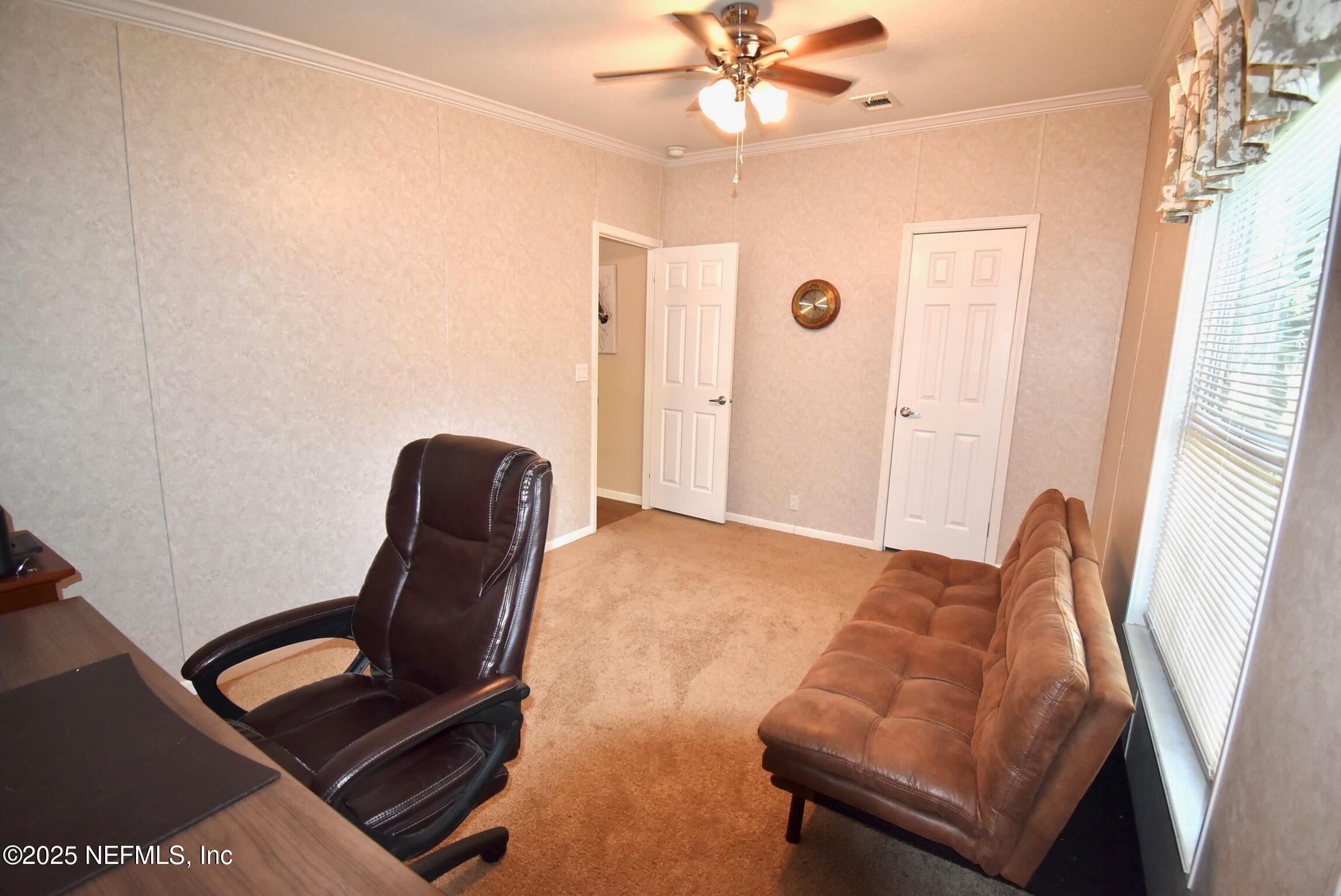 500 Georgetown Shortcut Road Georgetown, FL 32139 - Photo 48 of 59 a view of a workspace with furniture and a window
