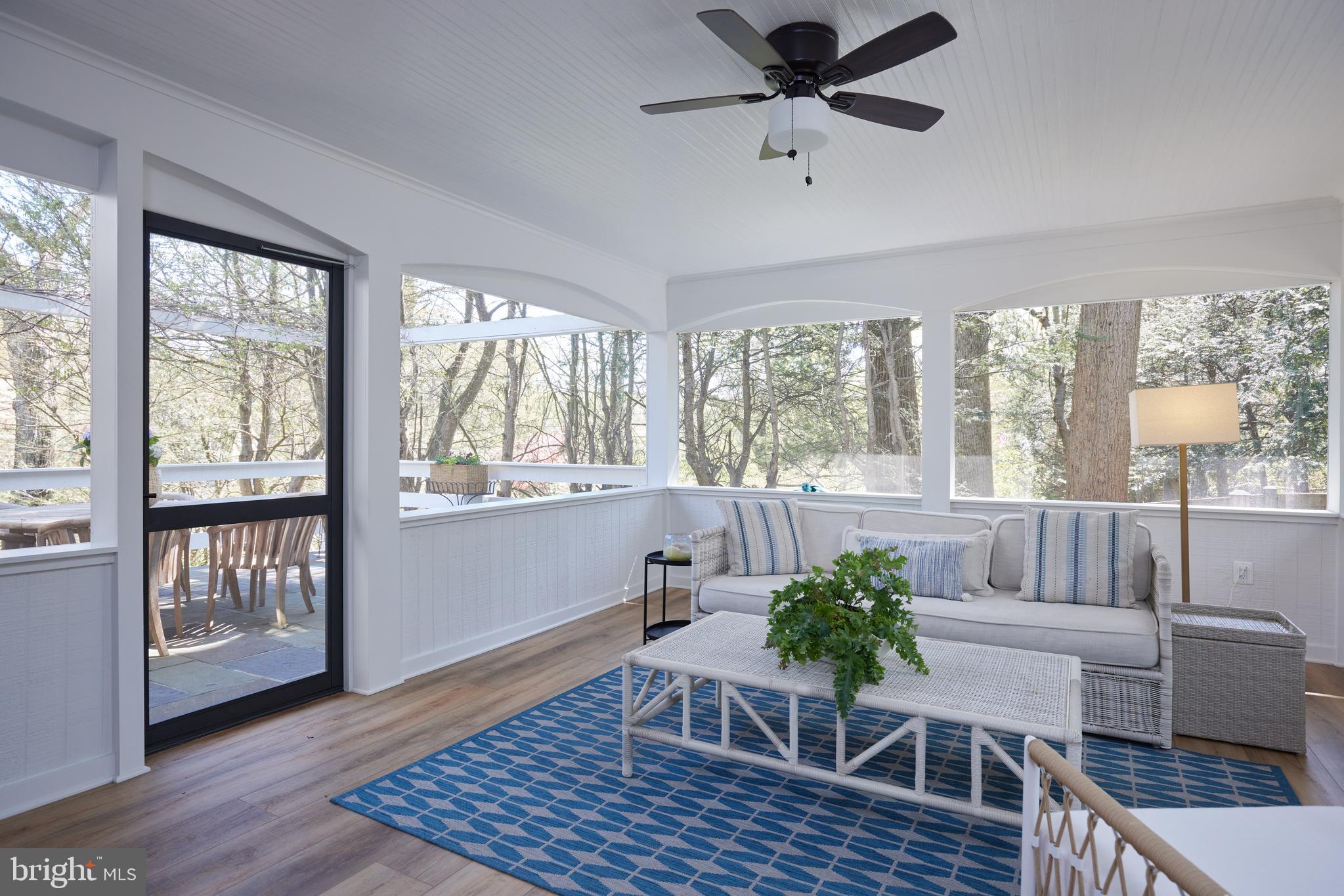 9604 Old Spring Road Kensington, MD 20895 - Photo 20 of 80 a living room with furniture and a large window