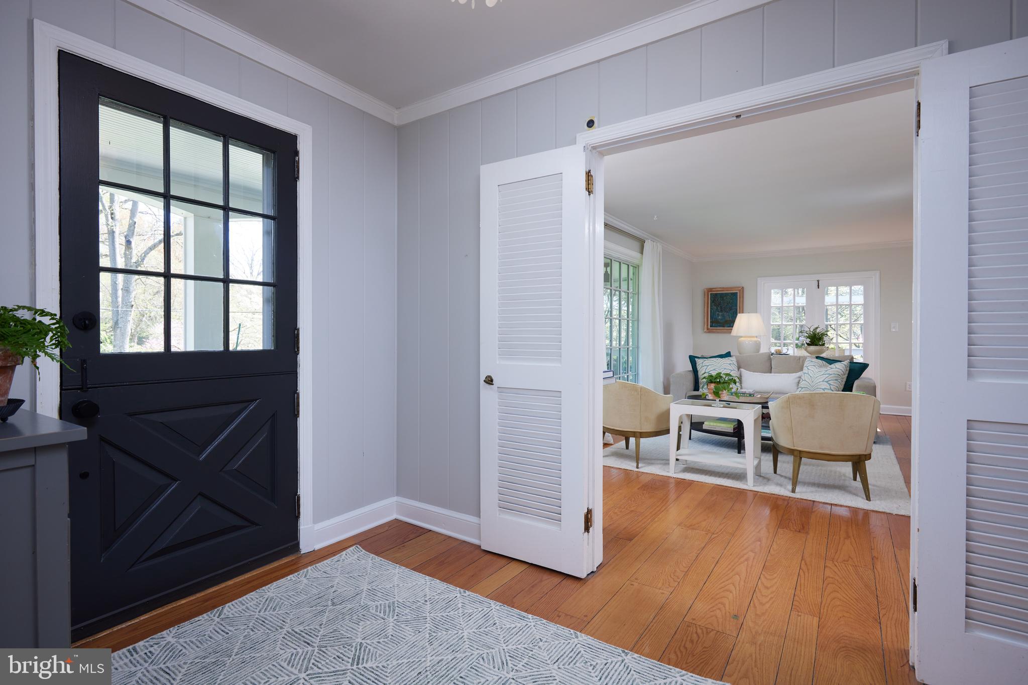 9604 Old Spring Road Kensington, MD 20895 - Photo 5 of 80 a living room with furniture and a wooden floor