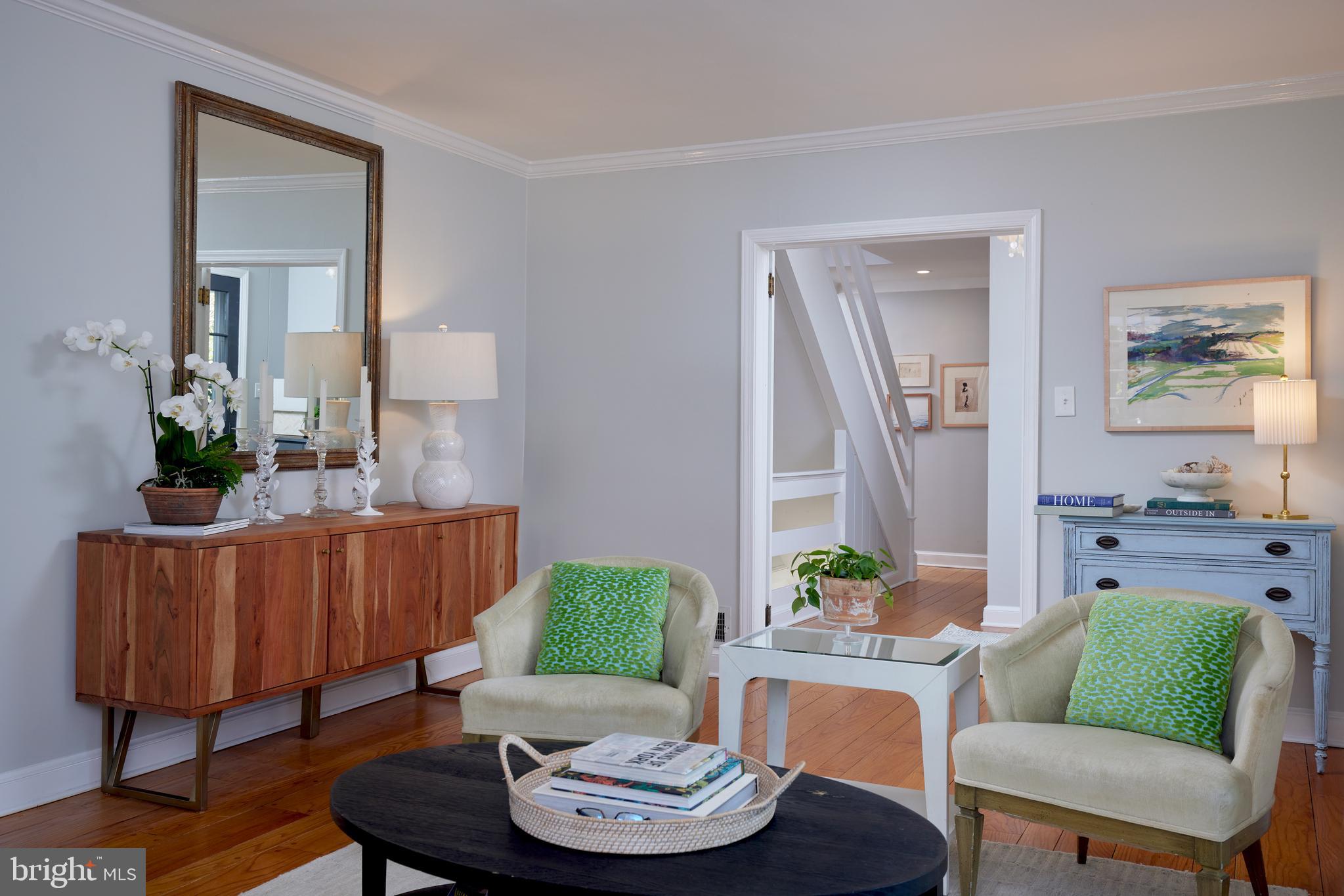 9604 Old Spring Road Kensington, MD 20895 - Photo 6 of 80 a living room with furniture and a wooden floor