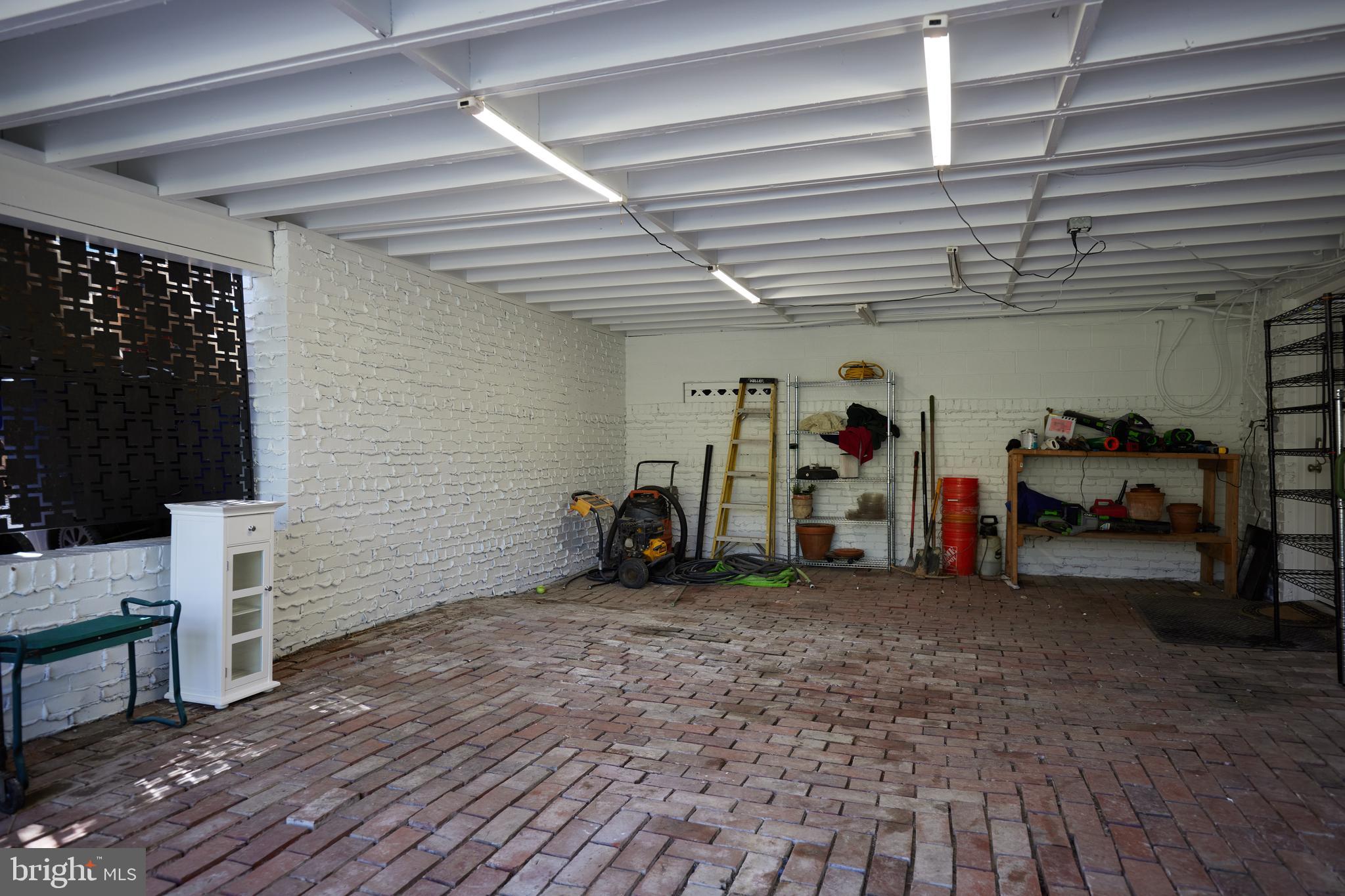 9604 Old Spring Road Kensington, MD 20895 - Photo 76 of 80 a view of a garage with furniture