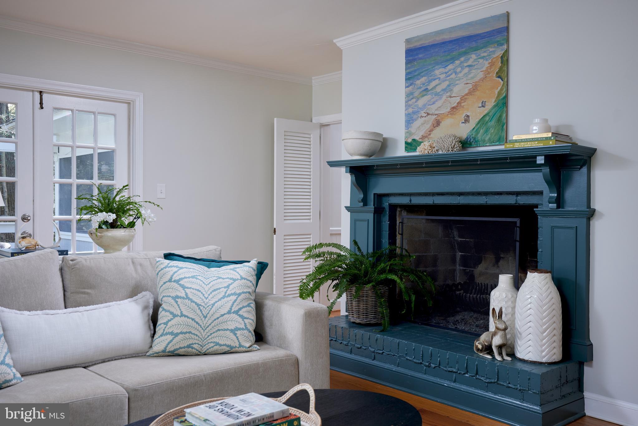 9604 Old Spring Road Kensington, MD 20895 - Photo 10 of 80 a living room with furniture and a fireplace