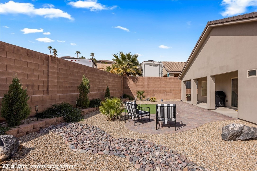 942 Shadow Hawk Ridge Mesquite, NV 89027 - Photo 51 of 67 Fenced backyard featuring a patio area