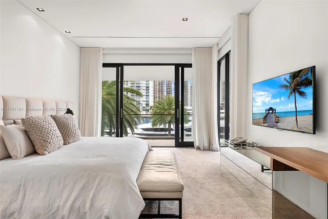 a swimming pool view with a outdoor seating