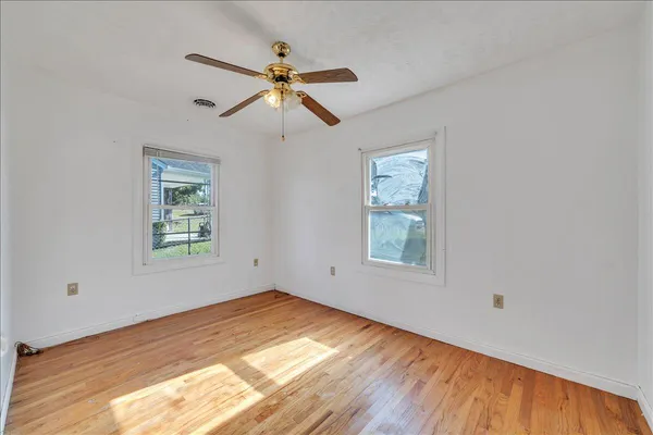 a view of room with window and fireplace