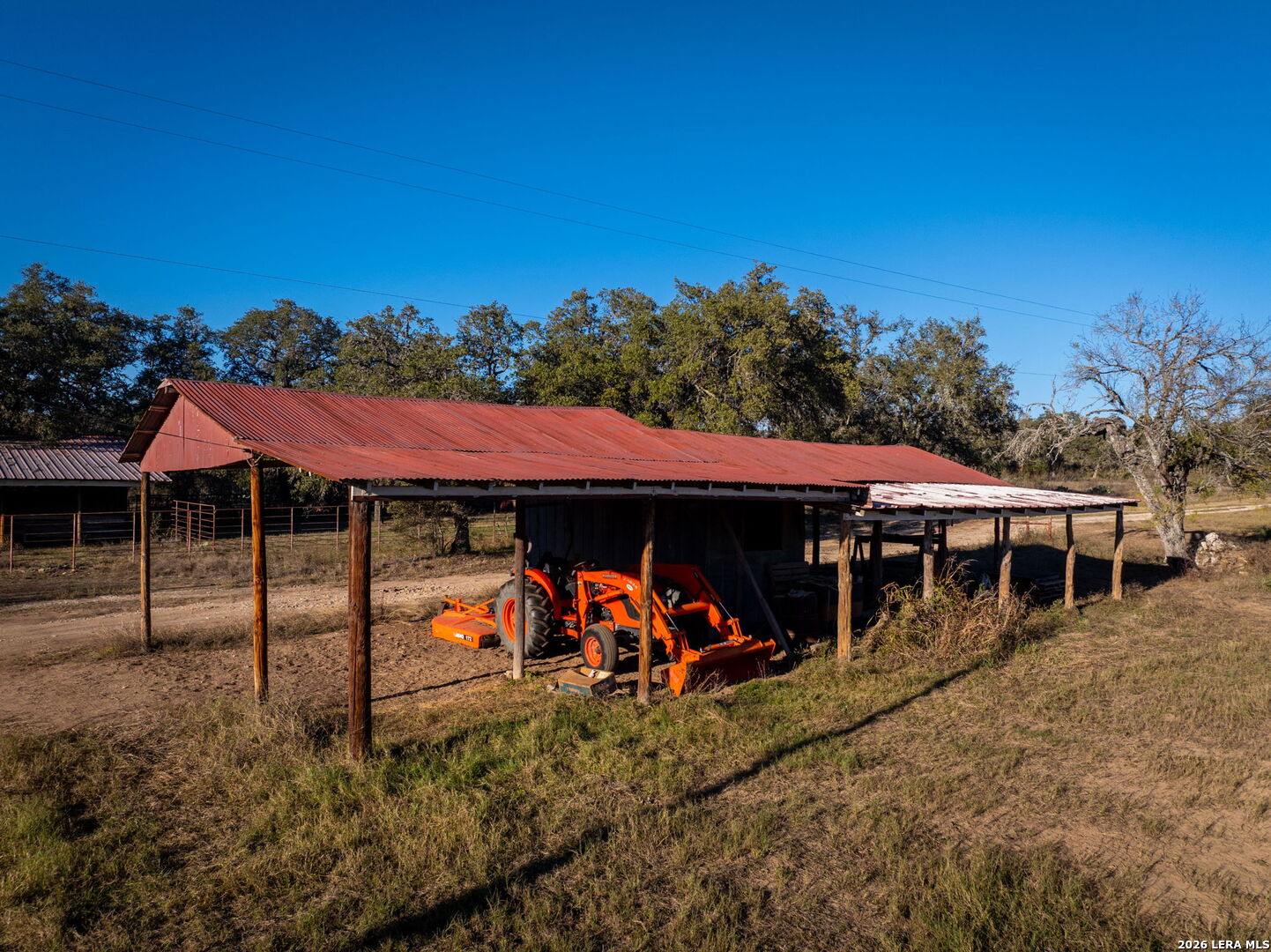 19512 Tonkawa Pass Garden Ridge, TX 78266 - Photo 45 of 67 a view of a large house with a yard and furniture