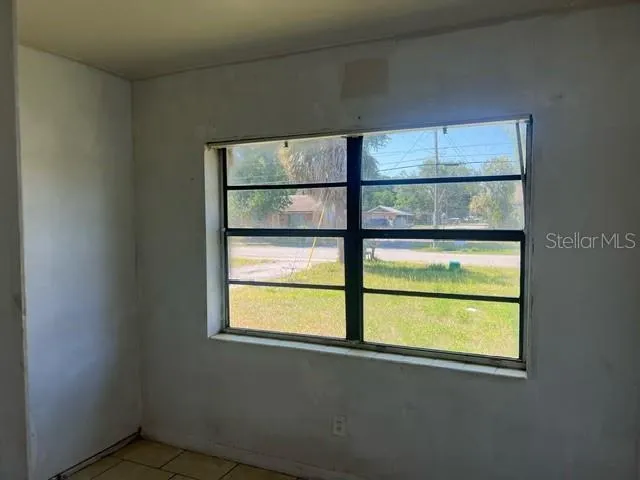 an empty room with a window