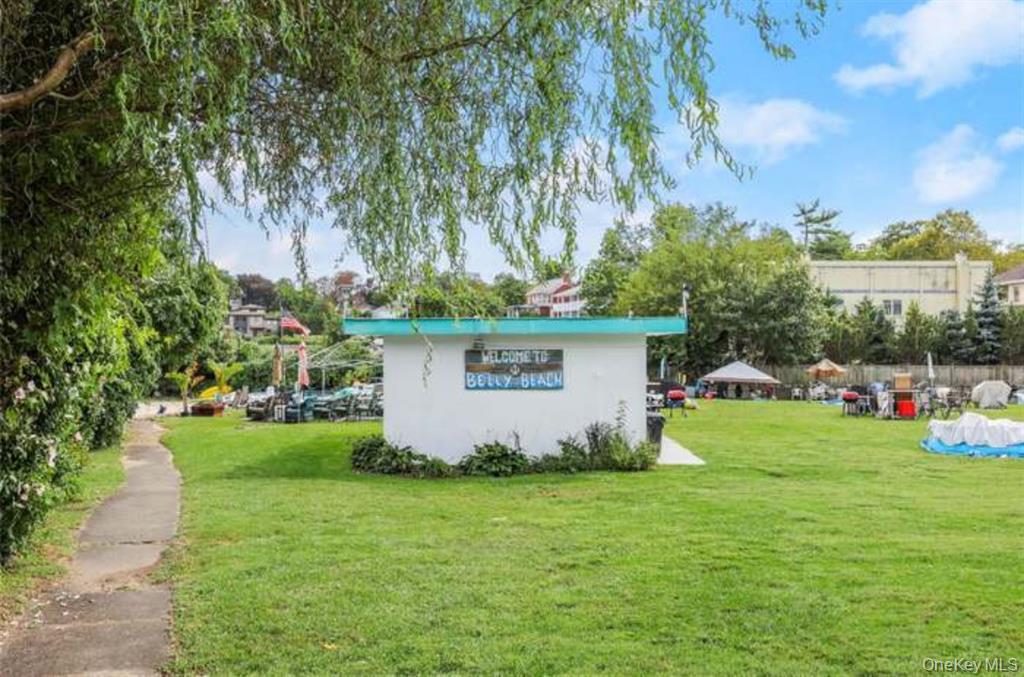 30 Davenport Avenue, Unit 1B New Rochelle, NY 10805 - Photo 11 of 16 a view of a backyard with plants and a garden