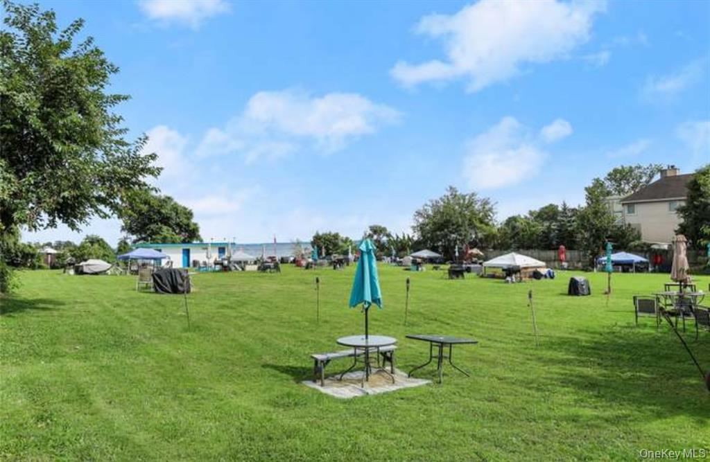 30 Davenport Avenue, Unit 1B New Rochelle, NY 10805 - Photo 12 of 16 a view of a park with large trees