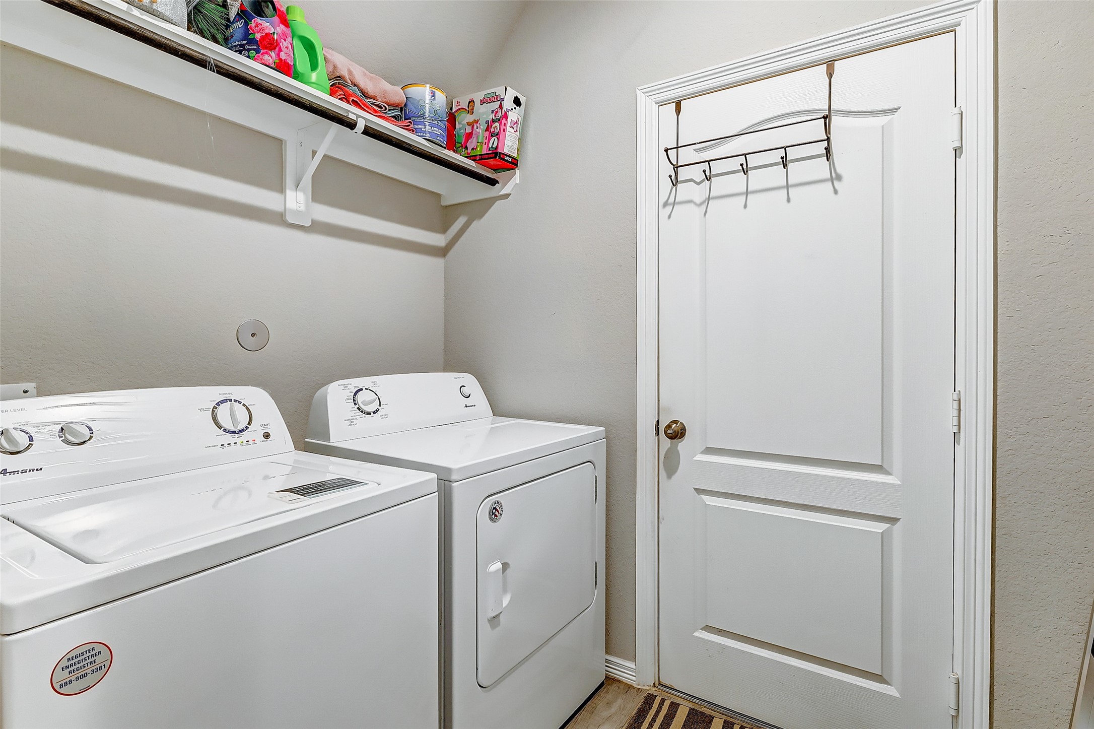 24715 Russet Bluff Trail Houston, TX 77336 - Photo 11 of 31 a utility room with dryer and washer