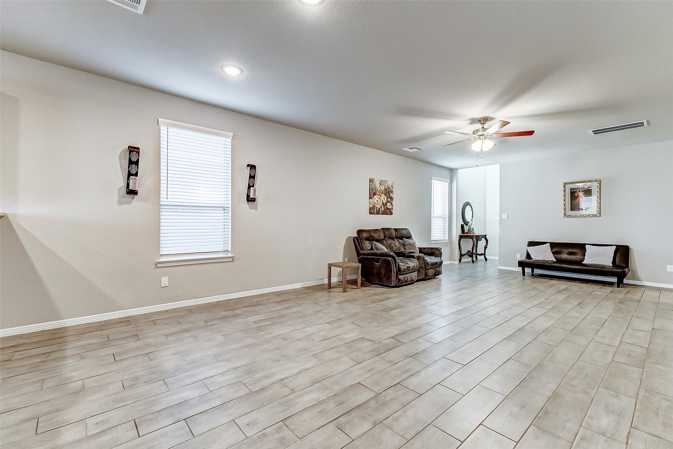 24715 Russet Bluff Trail Houston, TX 77336 - Photo 15 of 31 a view of a livingroom with furniture and a ceiling fan