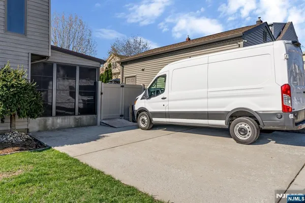 a car parked in front of a house