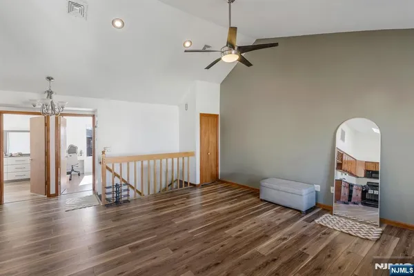 a view of livingroom with furniture and wooden floor