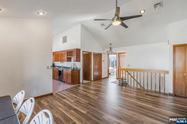 a view of a livingroom with wooden floor