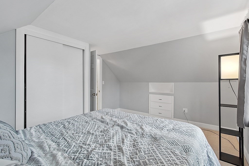 8 Gardner Road Reading, MA 01867 - Photo 25 of 35 a bedroom with a bed and a dresser