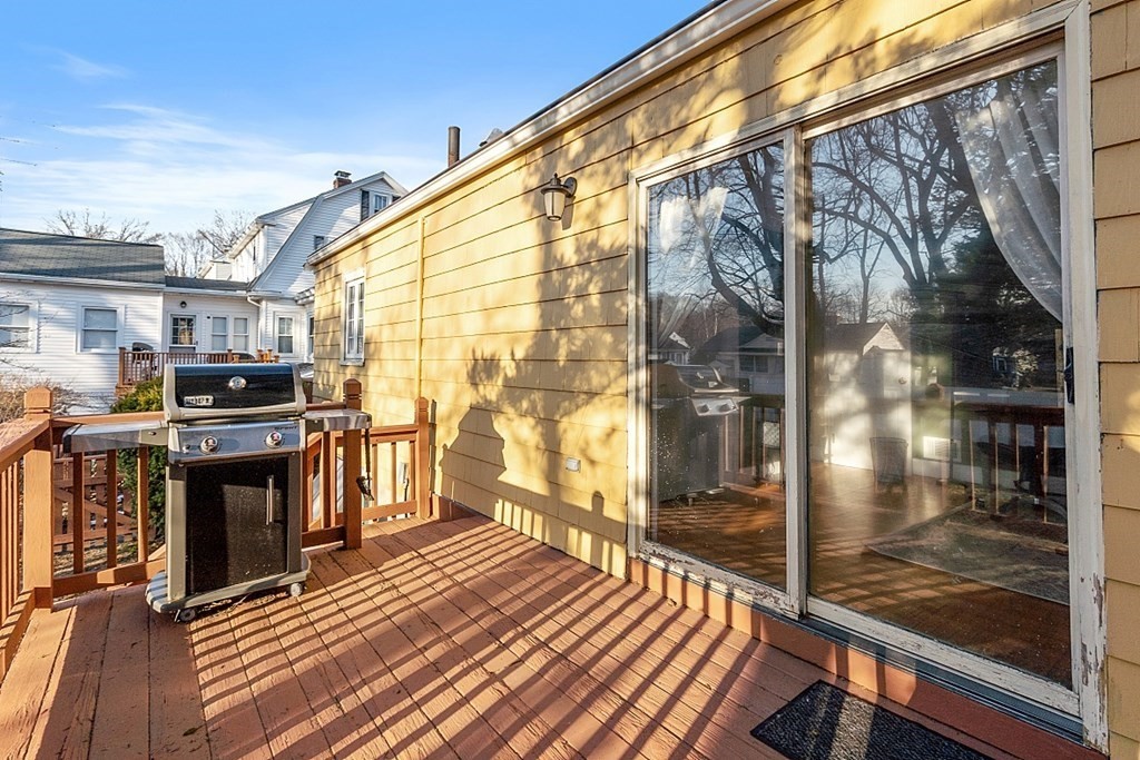 8 Gardner Road Reading, MA 01867 - Photo 28 of 35 a view of a balcony with wooden floor